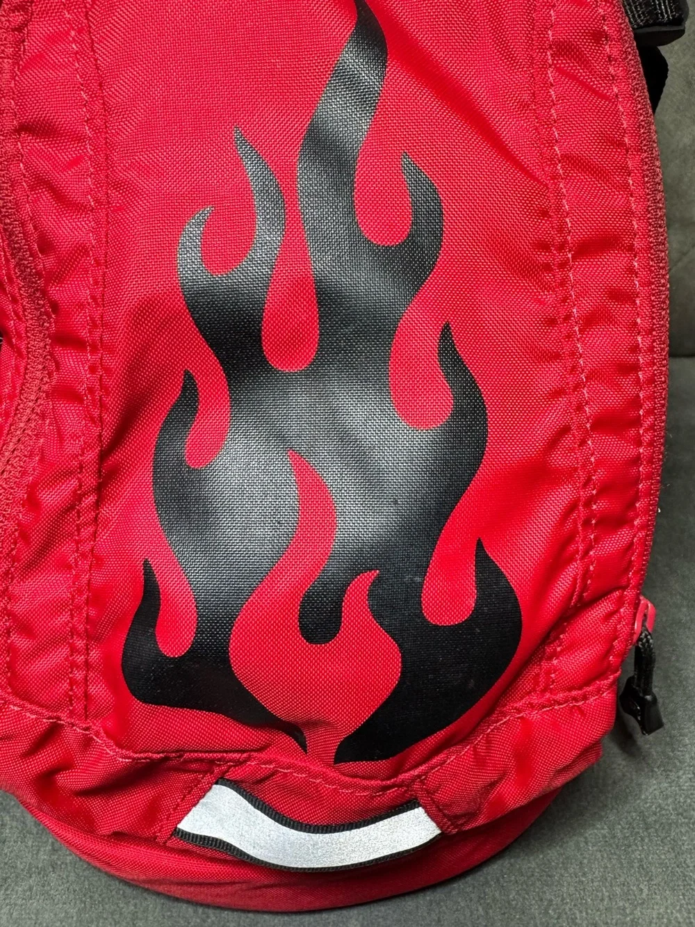 CamelBak Mini M.U.L.E. Kids’ Hydration Red Backpack with Black Flame Graphic